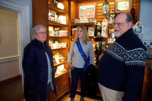 Daria Parnes. Carolyn Miller and Ken Rapuano in the museum gift shop